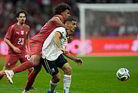 | Photo: AP/Fernando Llano : Mexico's German Berterame, right, is challenged by Portugal's Renato Veiga during the international friendly soccer match between Mexico and Portugal in Mexico City.