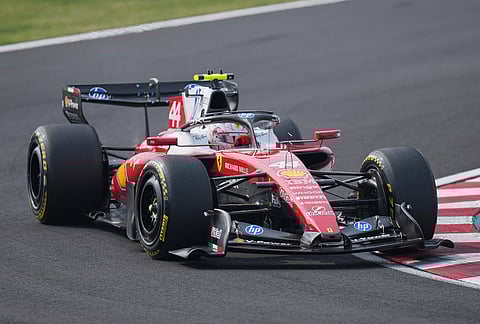 Ferrari driver Lewis Hamilton of Britain steers his car during the Japanese Formula One Grand Prix at Suzuka in central Japan.