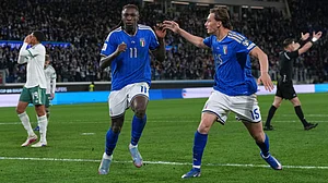 | Photo: AP/Antonio Calanni : Italy's Francesco Pio Esposito, right, celebrates with Moise Kean who scored his side's second goal during the World Cup qualifying play-off soccer match between Italy and Northern Ireland, in Bergamo, Italy, Thursday, March 26, 2026.