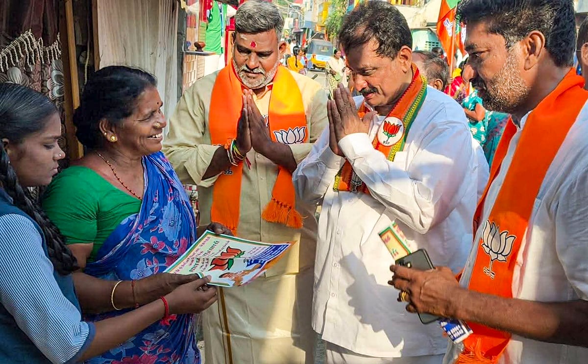 
Puducherry: BJP candidate from Muthialpet constituency, A. John Kumar, campaigns for Puducherry Assembly elections, Thursday, March 26, 2026.
Source: PTI - -