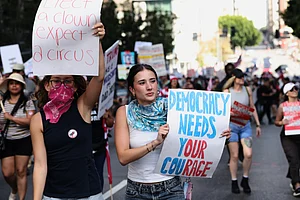 Source: AP
: Demonstrators march through downtown Los Angeles during a "No Kings" protest Saturday, March 28, 2026. (AP Photo/Jill Connelly)