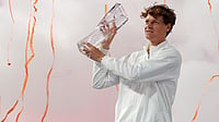 Miami Open 2026: Sinner Downs Lehecka To Complete Sunshine Double | Photo: AP/Rebecca Blackwell : Jannik Sinner of Italy hoists the Butch Buchholz trophy after defeating Jiri Lehecka of the Czech Republic in the men's singles final at the Miami Open tennis tournament, Sunday, March 29, 2026, in Miami Gardens, Fla.
