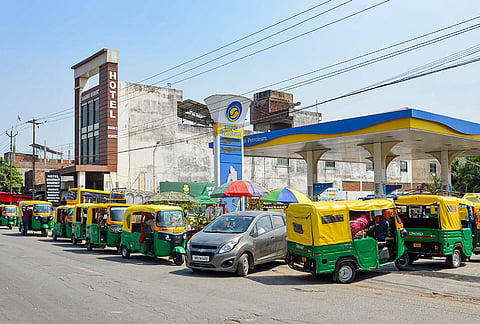 Auto-rickshaws are seen in a long queue at a fuel pump amid rumours of fuel shortage in the wake of the West Asian conflict, in Mirzapur, Uttar Pradesh.