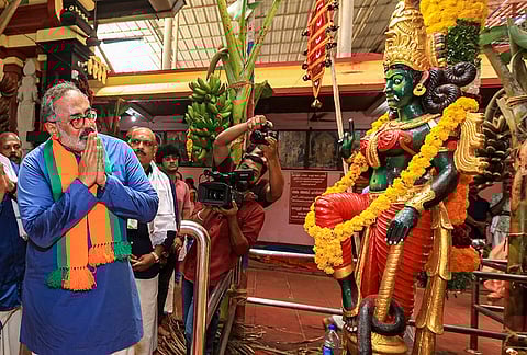 BJP state president and NDA candidate from Nemom constituency Rajeev Chandrasekhar visits Sree Pazhanchira Devi Temple during an election campaign ahead of the Kerala Legislative Assembly polls, in Thiruvananthapuram.