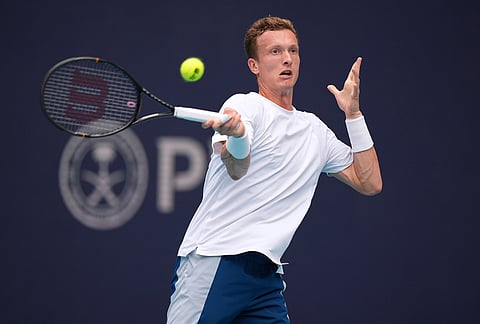 Jiri Lehecka of Czech Republic returns a ball in his men's singles final against Jannik Sinner of Italy, at the Miami Open tennis tournament, in Miami Gardens, Florida.