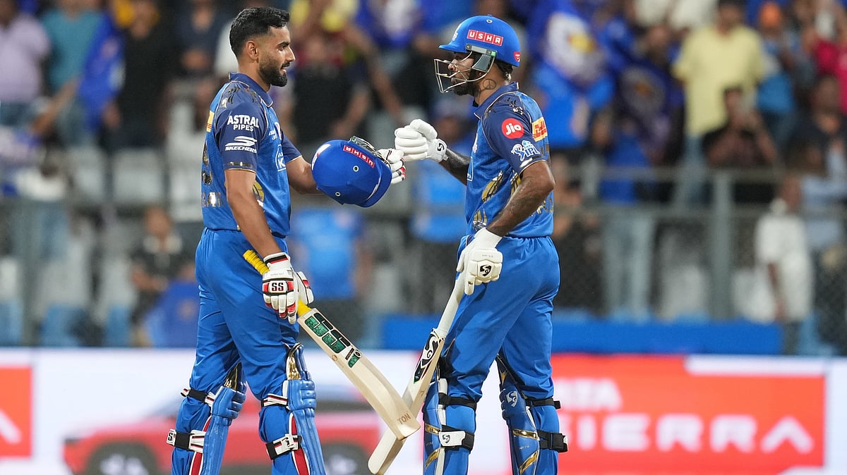 Mumbai Indians' captain Hardik Pandya, right, and Naman Dhir celebrate after won the match during the Indian Premier League cricket match between Mumbai Indians and Kolkata Knight Riders in Mumbai, India, Sunday, March 29, 2026. - | Photo: AP/Rafiq Maqbool