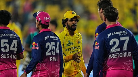 Chennai Super Kings' captain Ruturaj Gaikwad, centre, shakes hands with Rajasthan Royals players after losing the Indian Premier League match in Guwahati.