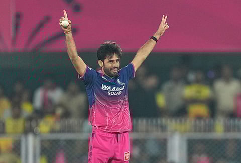 Rajasthan Royals' Ravi Bishnoi celebrates the wicket of Chennai Super Kings' Matt Henry during the Indian Premier League cricket match between Chennai Super Kings and Rajasthan Royals in Guwahati.