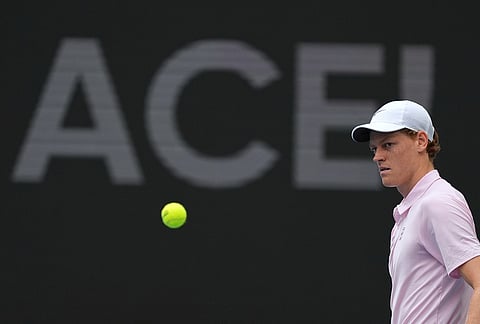 Jannik Sinner of Italy walks on the court after serving an ace against Jiri Lehecka of the Czech Republic in the men's singles final at the Miami Open tennis tournament, in Miami Gardens, Florida.