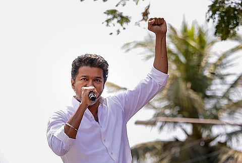 Tamilaga Vettri Kazhagam (TVK) chief and actor Vijay campaigns after filing his nomination papers for the Tamil Nadu Assembly elections from the Perambur constituency, in Chennai. 