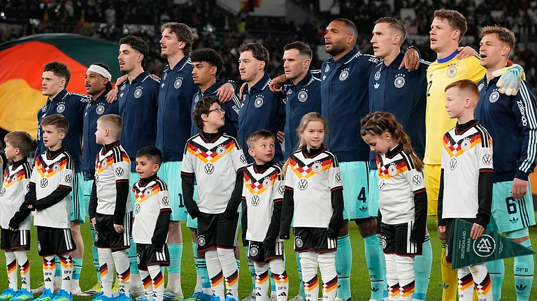 Team Germany sings the national anthem prior to an international friendly soccer match between Germany and Ghana in Stuttgart. - AP/Matthias Schrader