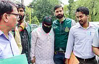 PTI : Delhi Police Special Cell personnel produce Shabir Ahmad Lone, an accused linked to Lashkar-e-Taiba (LeT) and alleged to be part of a module involved in defacing Delhi Metro station walls and planning further activities, at Patiala House Court, in New Delhi, Monday, March 30, 2026. 