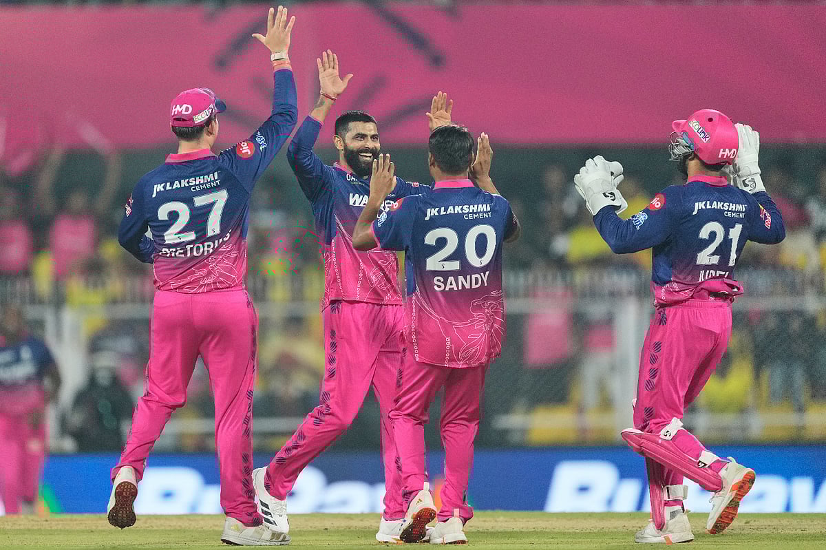 Rajasthan Royals' Ravindra Jadeja, second left, celebrates with teammates the wicket of Chennai Super Kings' Shivam Dube during the Indian Premier League cricket match between Chennai Super Kings and Rajasthan Royals in Guwahati, India, Monday, March 30, 2026