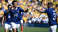 | Photo: AP/Nick Wass : France forward Désiré Doué (20) celebrates with Lucas Digne (3) after scoring the opening goal during the international friendly soccer match between Colombia and France in Landover, Md., Sunday, March 29, 2026. 