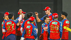 IPL/X : Punjab Kings' Vijaykumar Vyshak celebrates with teammates after a wicket of Gujarat Titans' during the Indian Premier League cricket match between Gujarat Titans and Punjab Kings in New Chandigarh, India, Tuesday, March 31, 2026.