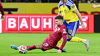(Pontus Lundahl/TT via AP) : Poland's Sebastian Szymanski and Sweden's Benjamin Nygren during a World Cup qualifying playoff final soccer match between Sweden and Poland in Stockholm, Tuesday, March 31, 2026.