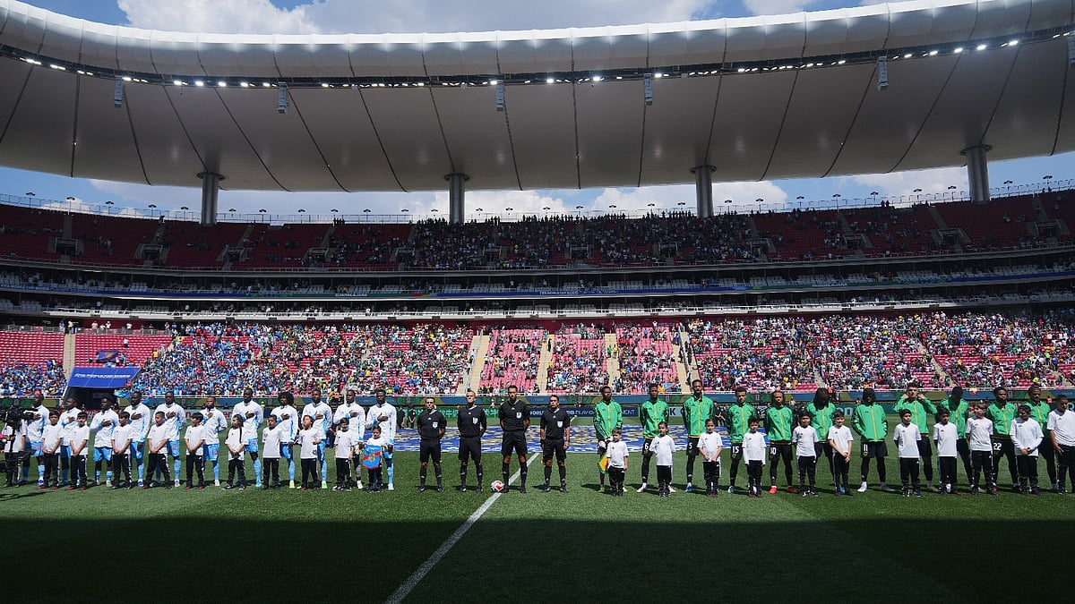 Players line up for anthems prior to the World Cup playoff final soccer match between DR Congo and Jamaica in Guadalajara, Mexico, Tuesday, March 31, 2026.  - AP Photo/Eduardo Verdugo