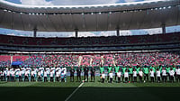 AP Photo/Eduardo Verdugo : Players line up for anthems prior to the World Cup playoff final soccer match between DR Congo and Jamaica in Guadalajara, Mexico, Tuesday, March 31, 2026. 
