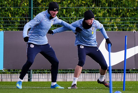 England's James Garner and Cole Palmer during a training session in London.