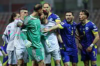 Bosnia 0-1 Italy LIVE Score, FIFA World Cup 2026 Play-offs Final: Azzurri Lose Bastoni To Red Card After Kean Goal AP : Teammates separate Italy goalkeeper Gianluigi Donnarumma and Bosnia's Amar Dedic, right, during the World Cup qualifying playoff final soccer match between Bosnia and Italy in Zenica, Bosnia, Tuesday, March 31, 2026