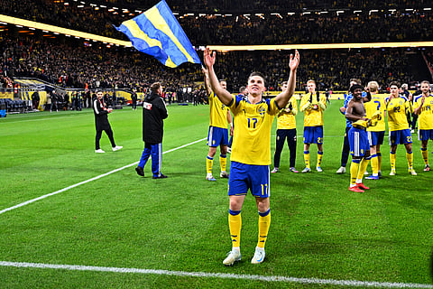 Sweden's Viktor Gyökeres celebrates qualifying for the World Cup after a World Cup qualifying playoff final soccer match between Sweden and Poland in Stockholm.