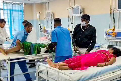 Injured persons receive treatment at a hospital after a stampede at the Shitala Mata temple, in Nalanda district, Bihar. At least eight women were allegedly killed in the incident following a heavy rush of devotees. 