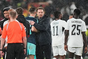 | Photo: AP/Matthias Schrader : Head coach Julian Nagelsmann of Germany embraces players after winning an international friendly soccer match between Germany and Ghana in Stuttgart, Germany.