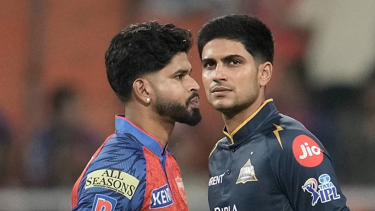 Punjab Kings' captain Shreyas Iyer, left, and Gujarat Titans' captain Shubman Gill looks on before the toss during the Indian Premier League cricket match between Gujarat Titans and Punjab Kings in New Chandigarh, India, Tuesday, March 31, 2026. - AP Photo