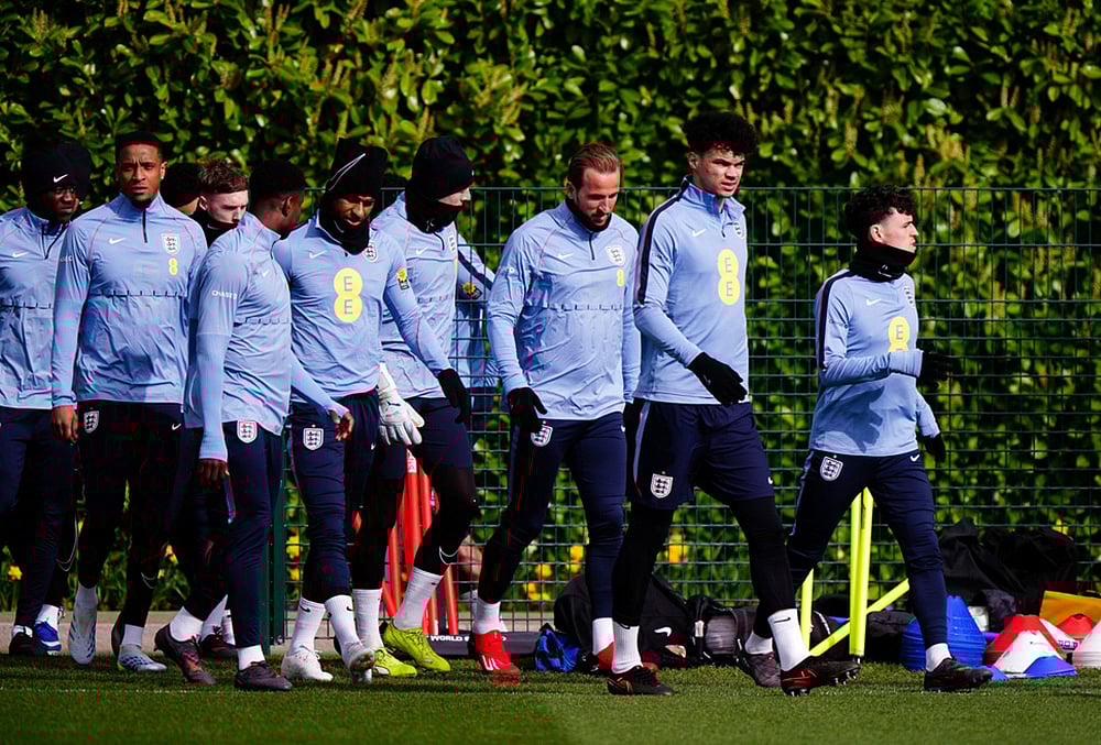 England's Phil Foden, Nico O'Reilly, and Harry Kane with team mates during a training session in London. - | Photo: Bradley Collyer/PA via AP