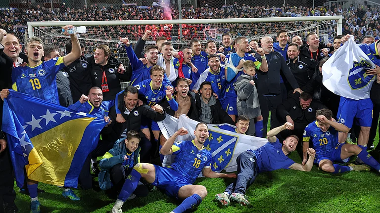 Bosnia players celebrate after winning a penalty shootout at the end of the World Cup qualifying playoff final soccer match between Bosnia and Italy in Zenica, Bosnia, Tuesday, March 31, 2026. - AP Photo