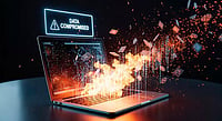 Crypto Cyber Attacks: Why Security Matters More Than Ever Data compromised alert on a burning laptop