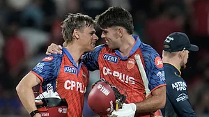 AP Photo : Punjab Kings' Cooper Connolly, left, and Xavier Bartlett celebrates the win against Gujarat Titans during the Indian Premier League cricket match in New Chandigarh, India, Tuesday, March 31, 2026
