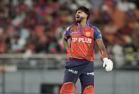 Shreyas Iyer Injury Scare: India Batter Hit By Cooper Connolly's Shot During PBKS Vs GT, IPL 2026 Match | Photo: AP/Ashwini Bhatia : Punjab Kings' captain Shreyas Iyer winces in pain after getting hit by a shot from batting partner Cooper Connolly during the Indian Premier League cricket match between Gujarat Titans and Punjab Kings in New Chandigarh.