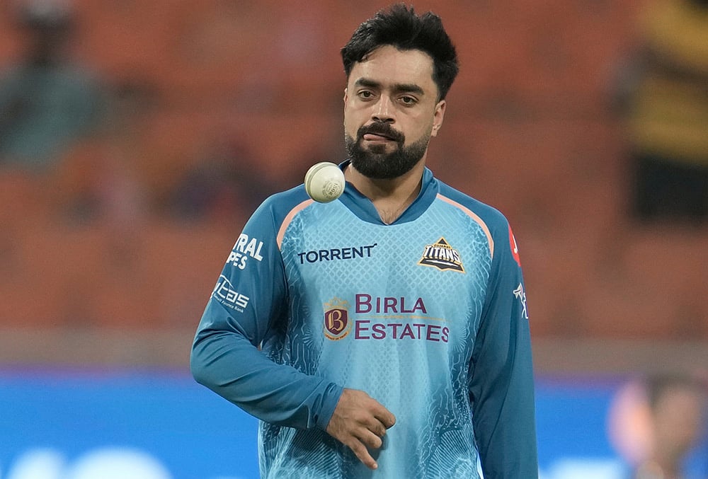 Gujarat Titans vs Punjab Kings IPL 2026 match photos-Rashid Khan