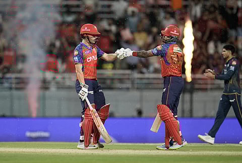 Punjab Kings' Cooper Connolly and Shreyas Iyer encourage each other as they bat during the Indian Premier League cricket match between Gujarat Titans and Punjab Kings in New Chandigarh.