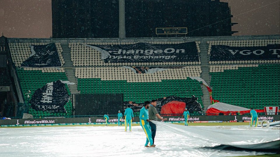 Lahore's Gaddafi Stadium under covers during Islamabad United vs Peshawar Zalmi PSL 2026 match.  - thepslt20/X