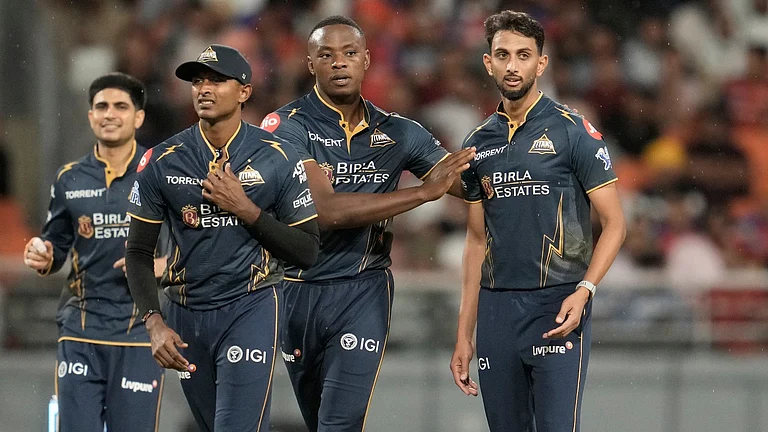 Gujarat Titans' Prasidh Krishna celebrates with teammates the wicket of Punjab Kings' captain Shreyas Iyer during the Indian Premier League cricket match between Gujarat Titans and Punjab Kings in New Chandigarh, India, Tuesday, March 31, 2026. - AP Photo