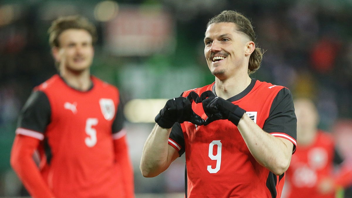 Austria's Marcel Sabitzer celebrates after scoring his side's opening goal during the international friendly soccer match between Austria and South Korea in Vienna, Austria, Tuesday, March 31, 2026.  - AP Photo/Heinz-Peter Bader