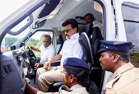 Election flying squad officials check the vehicle of Tamil Nadu Chief Minister MK Stalin at Saliamangalam junction on the Tiruchi-Nagapattinam highway as he proceeds to Tiruvarur for an election campaign, in Tiruchirappalli.