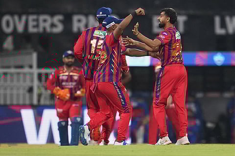 Lucknow Super Giants' Prince Yadav, right, celebrates with teammates the dismissal of Delhi Capitals' Pathum Nissanka during the Indian Premier League cricket match between Lucknow Super Giants and Delhi Capitals in Lucknow, India.