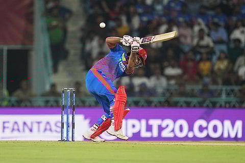 Delhi Capitals' Nitish Rana attempts to play a rising delivery during the Indian Premier League cricket match between Lucknow Super Giants and Delhi Capitals in Lucknow, India.
