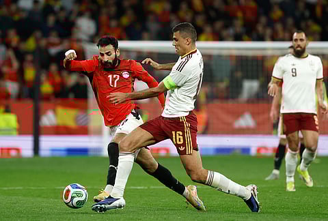Spain's Rodri, right, challenges for the ball with Egypt's Mohanad Lasheen during the international friendly soccer match between Spain and Egypt in Barcelona, Spain.