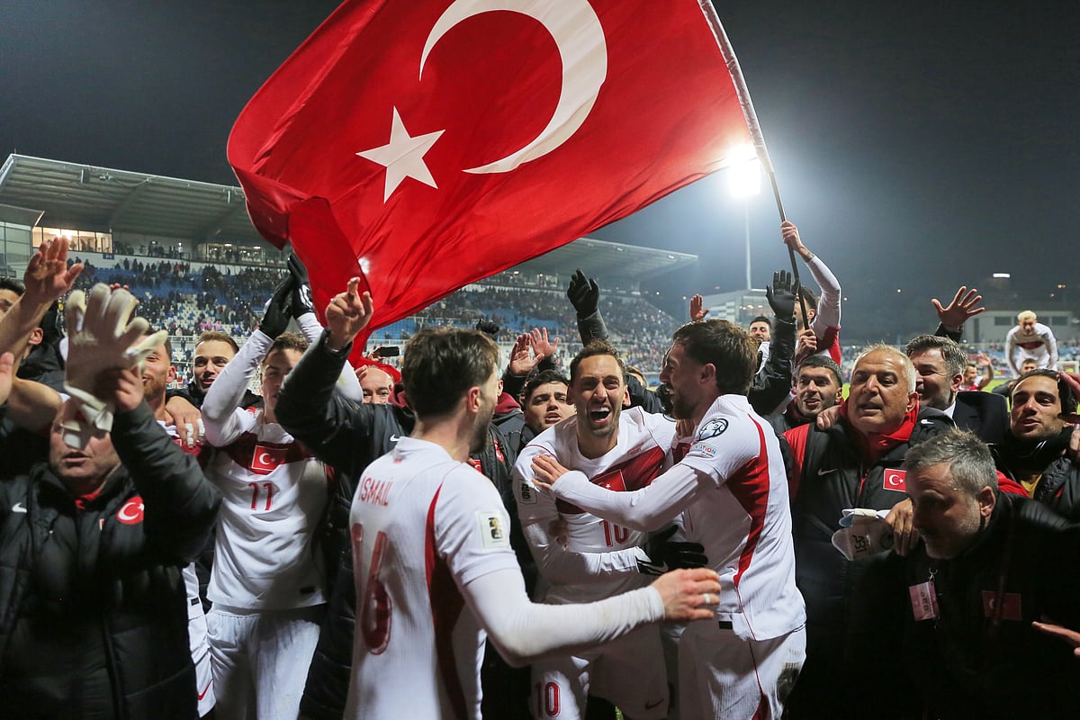 Turkey's players celebrate after winning the World Cup qualifying playoff final soccer match between Kosovo and Turkey in Pristina, Kosovo. - AP/Visar Kryeziu