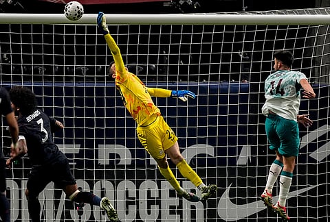 USA goalkeeper Matt Freese (24) makes a save against Portugal during the first half of an international friendly soccer match, in Atlanta.