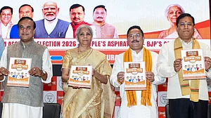 PTI : From left, Assam Chief Minister Himanta Biswa Sarma, Union Finance Minister Nirmala Sitharaman, state BJP president Dilip Saikia and Union Minister of Ports, Shipping and Waterways Sarbananda Sonowal during the Bharatiya Janata Party Assam unit's election manifesto release ahead of the state Assembly elections, at the party's state headquarters, in Guwahati, Tuesday, March 31, 2026.