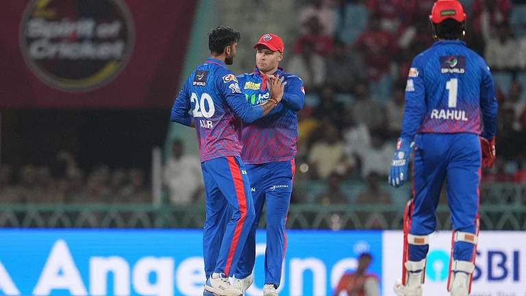 Delhi Capitals' captain Axar Patel, left, celebrates with teamates the dismissal of Lucknow Super Giants' Aiden Markram during the Indian Premier League cricket match between Lucknow Super Giants and Delhi Capitals in Lucknow, India, Wednesday, April 1, 2026. - AP