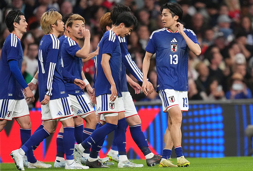 England Vs Japan FIFA International Friendly-Japan players celebrate scoring a goal