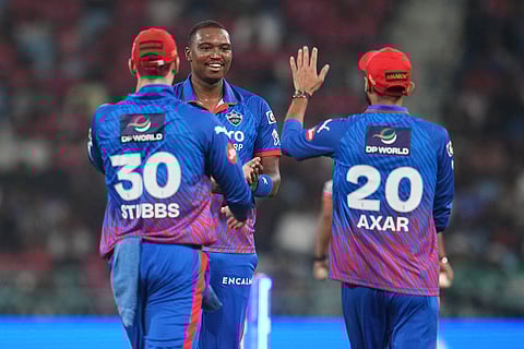 Delhi Capitals' Lungi Ngidi, center, celebrates with teammates the dismissal of Lucknow Super Giants' Anrich Nortje during the Indian Premier League cricket match between Lucknow Super Giants and Delhi Capitals in Lucknow, India.