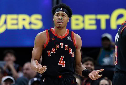 Toronto Raptors forward Scottie Barnes (4) reacts after being whistled for a foul during the first half of an NBA basketball game against the Detroit Pistons in Detroit. 
