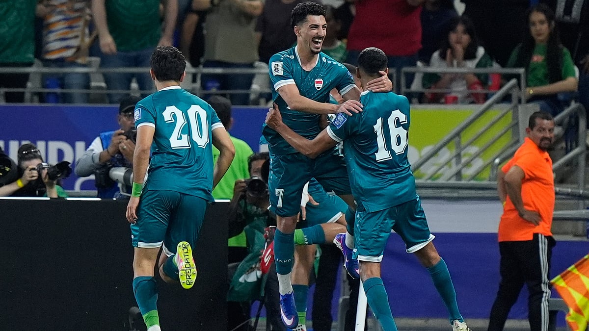 Iraq's players celebrate after their teammate Ali Al-Hamadi scored during the World Cup playoff final soccer match between Iraq and Bolivia in Monterrey, Mexico, Tuesday, March 31, 2026 - (AP Photo/Fernando Llano)